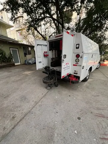 Magnet Plumbing service vehicle on-site for Grease Trap Cleaning in South Groveland